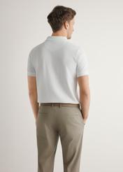Cream cotton polo shirt POLMT-0086-0B(W26), back view of the product on the model. Half of the silhouette visible.
