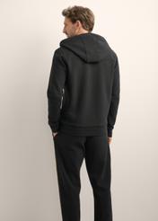 Men's black zip-up hoodie BLZMT-0083-99(Z26), product view from the back on the model. Half of the silhouette visible.