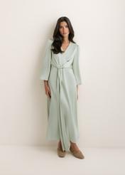 Sage midi dress SUKDT-0263-8F(W26), front view of the product on the model. Full silhouette visible.