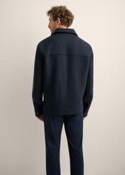 Navy blue men's wool coat PLAMT-0010-7D(Z26). Rear view of the product on a model. Half of the silhouette is visible.