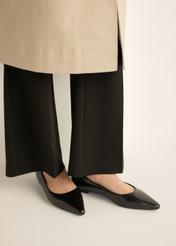 Women's black leather ballerinas BUTYD-1308-99(Z26) - front view of the product, on the model's feet, on a light background.