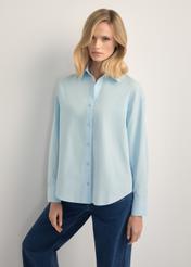 Blue cotton women's shirt KOSDT-0181-7A(W26), front view of the product on the model. Half of the silhouette visible.