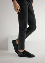 Black men's leather shoes BUTYM-0430A-99(W25), side view of the product on the model, half of the silhouette visible.