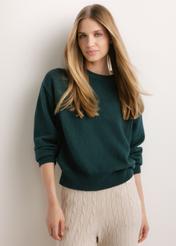 Women's turquoise oversized sweater SWEDT-0280-7F(Z26), front view on a model. Half-body shot.