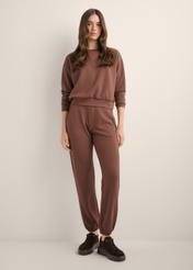 Brown women's sweatshirt BLZDT-0119-1H(Z26), front view of the product on the model. Full body visible.