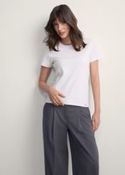 White cotton women's t-shirt TSHDT-0144-11(Z25), front view of the product on the model, half of the silhouette visible.