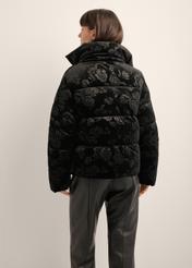 Women's black floral jacket KURDT-0673-99(Z26) - back view of the product, on a model, against a light background. Half of the silhouette visible.
