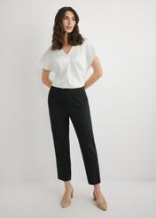 Black elegant women's trousers SPODT-0109-99(W26), front view of the product on the model. Full body visible.