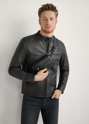 Small black leather men's bag TORMS-0492-99(W26), front view of the product on the model, the entire silhouette is visible.