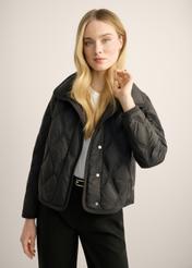 Black women's transitional jacket KURDT-0664-99(Z26). Front view of the product on a model. Half of the silhouette is visible.