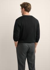 Black men's sweater with logo SWEMT-0159A-99(Z26), back view of the product on the model. Half of the silhouette visible.
