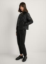Women's black transitional jacket KURDT-0564A-99(W26), side view of the product on the model. Full body visible.