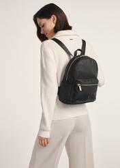 TOREN-0319-99 (Z25) women's compact backpack - front view of the product on a model against a white background. Full back view.