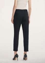 Black women's trousers with a crease SPODT-0098-99(Z24), view of the product from the back on the model, half of the silhouette visible.
