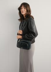 Black women's shoulder bag TOREC-1123-99(W26), front view of the product on a model, half of the silhouette visible.