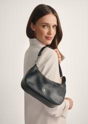 Small black women's handbag TOREC-1134-99(W26) - front view of the product, on a model, against a white background. Half of the silhouette visible.