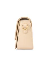 Small cream women's handbag TOREC-1171-0B(W26), product view from the side on a white background.