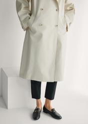 Women's black leather moccasins BUTYD-0916A-99(W26), front view of the product on the model's feet.