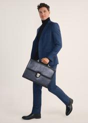 Men's leather briefcase TORMS-0478-99(Z25), front view of the product on the model, half of the silhouette visible.