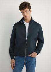 Men's navy blue transitional jacket KURMT-0404-7D(W26), front product view on model. Half silhouette visible.