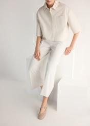 Women's leather ballet flats in cool beige color BUTYD-1244-1K(W26), front view of the product on the model's feet.