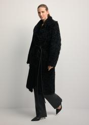 Black double-sided women's sheepskin coat KOZDS-0091-1395(Z25), front view of the product on a model. Full body visible.