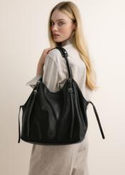 Black women's faux leather shopper bag TOREC-1371-99(Z26); front view of the product on the model's shoulder.