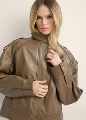 Brown oversized women's leather jacket KURDS-0648-9B(Z26), front view of the product on the model. Half of the silhouette visible.