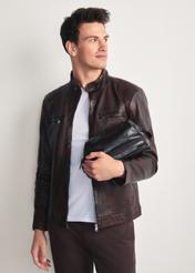 Men's glossy cosmetic bag TORMS-0479-99(Z25), front view of the product on the model, half of the silhouette visible.