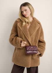 Small burgundy leather women's handbag TORES-1364-4D(Z26), product view on model's shoulder. Half silhouette visible.