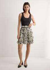 Women's cream patterned skirt SPCDT-0128-1P(W26), front view of the product on the model. Full body visible.
