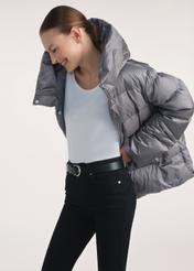 Gray women's down jacket KURDT-0585-91(Z25), side view of the product on the model, half of the silhouette visible.