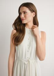 Cream viscose midi dress SUKDT-0280-0B(W26) - front view of the product, on a model, against a light background. Half of the silhouette visible.