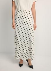 Women's white polka dot skirt SPCDT-0122-0P(W26), front view of the product on the model. Half of the silhouette visible.