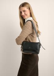 Black leather women's handbag TORES-1377-99(Z26), front view of the product on a model. Half of the silhouette visible.