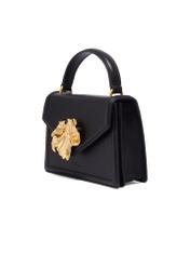 Black small women's handbag with decoration TORES-1393-99(Z26), diagonal product view on a white background.