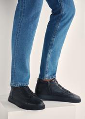 Black men's leather sneakers BUTYM-0466-99(Z25), product view on model's feet against a light background.