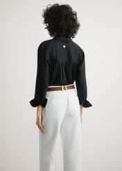 Women's black linen shirt KOSDT-0163A-99(W26) - back view of the product on a model, against a light background. Knee-length silhouette visible.