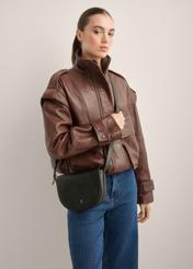 Women's black leather messenger bag TORES-1352-99(Z26), diagonal view of the product on the model. Half of the silhouette visible.