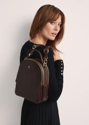 Brown leather women's backpack TORES-1048A-89(Z25) - product view slightly diagonal on model against white background. Half of silhouette visible.