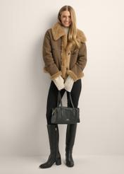 Women's black leather handbag TORES-1431-9I(Z26), front view of the product on a model. Full body visible.