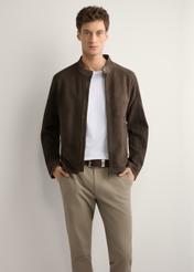 Brown men's suede jacket KURMS-0396-1I(W26) - front view of the product, on a model, against a light background. Half of the silhouette visible.