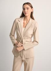 Women's beige belted blazer ZAKDT-0030-1B(W26) - front view of the product, on a model, against a light background. Half of the silhouette visible.