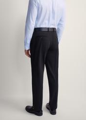 Black men's suit trousers SPOMT-0113-99(Z25), product view from the back on the model, half of the silhouette visible.
