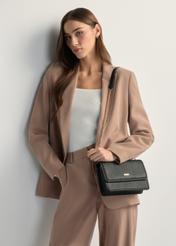 Small, elegant women's handbag TOREC-1015-99(W26), front view of the product on a model, half of the silhouette visible.