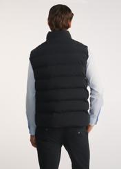 Black men's vest KAMMT-0008-99(Z25), product view from the back on the model, half of the silhouette visible.