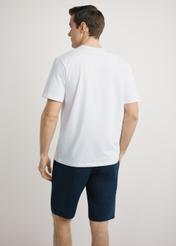 Men's white T-shirt with print TSHMT-0145-0A(W26), back view of the product on the model. Half of the silhouette visible.