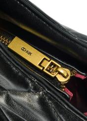 Black quilted women's handbag TOREC-1057-99(Z25), close-up of the product zipper, view on a white background.