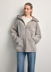 Light gray women's sheepskin coat KOZDS-0092-3098(Z25), front view of the product on a model. Half of the silhouette visible.