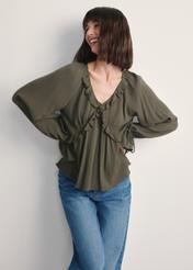 Women's khaki blouse BLUDT-0194-55(Z25), front view of the product on the model, half of the silhouette visible.